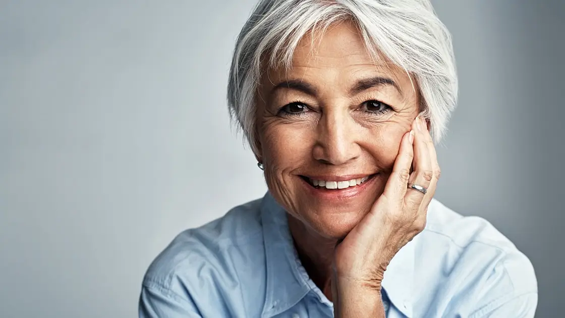 woman smiling dentures